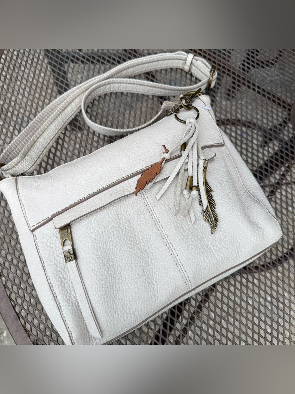 The Sak Stone Pebbled Leather Crossbody Shoulder Bag Boho Feather Shaped Charms